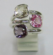 sterling silver White topaz, pink topaz and amethyst rings worn together.